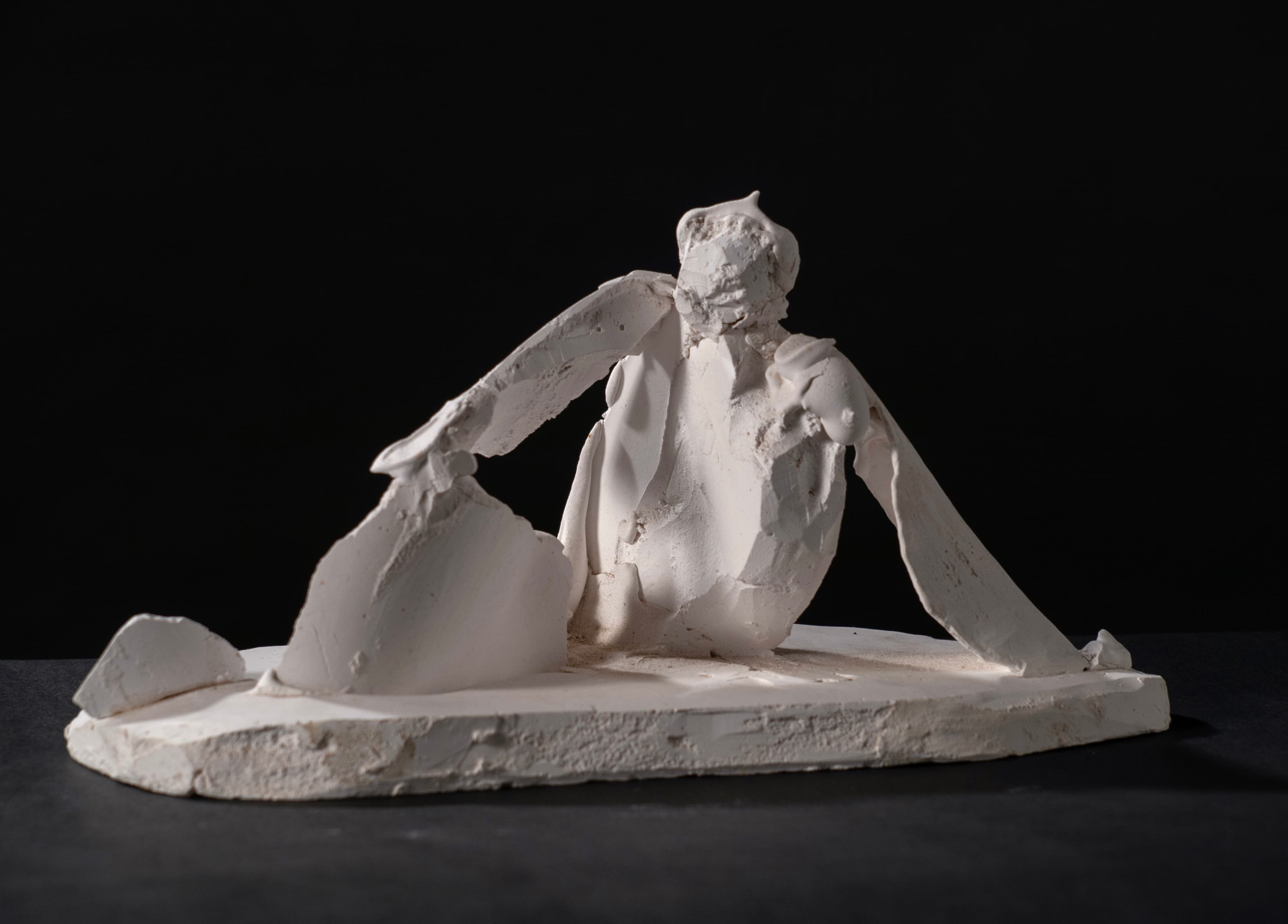 Art with the title "Reclining Figure".