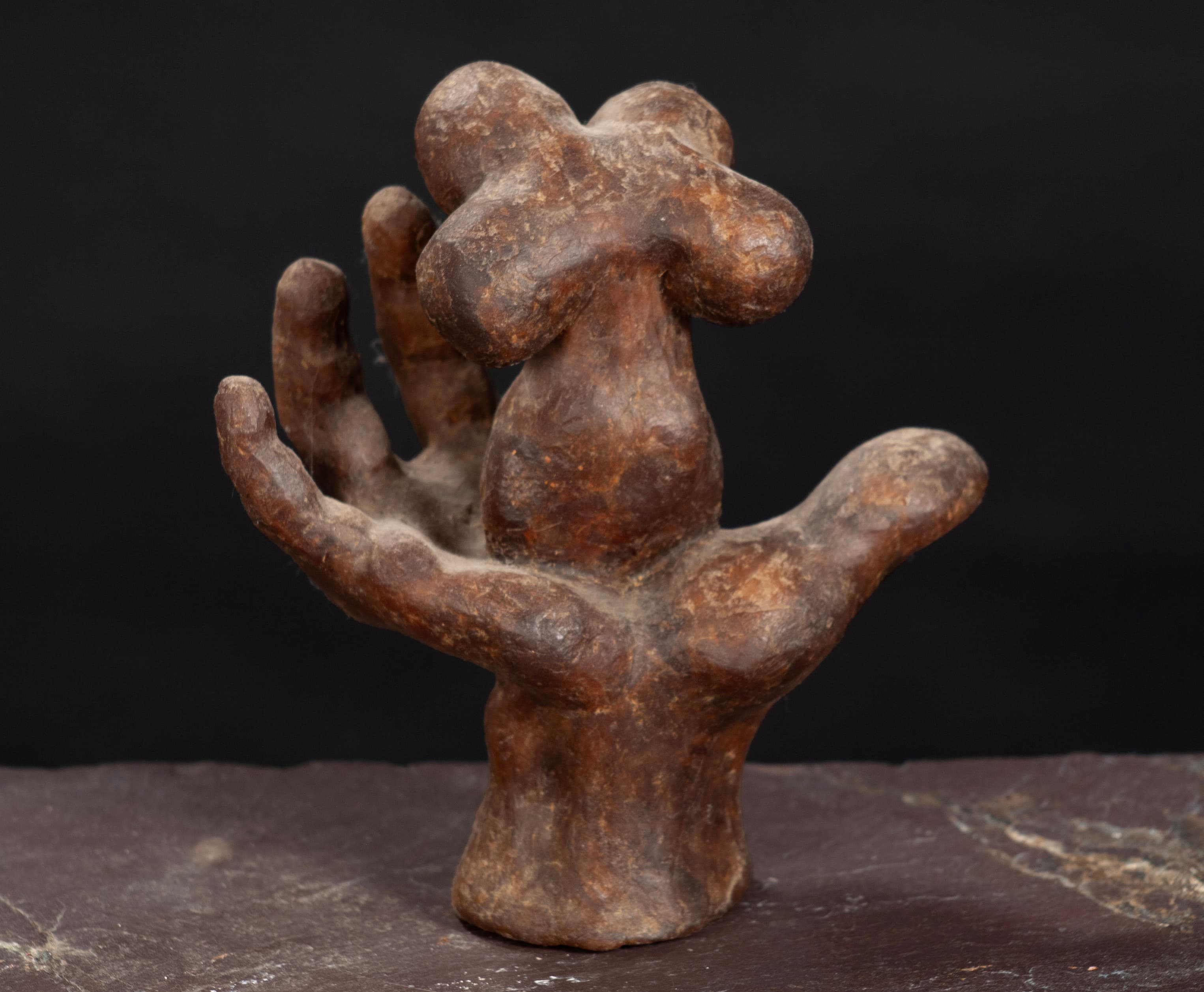 Art with the title "Open Hand with Figure".