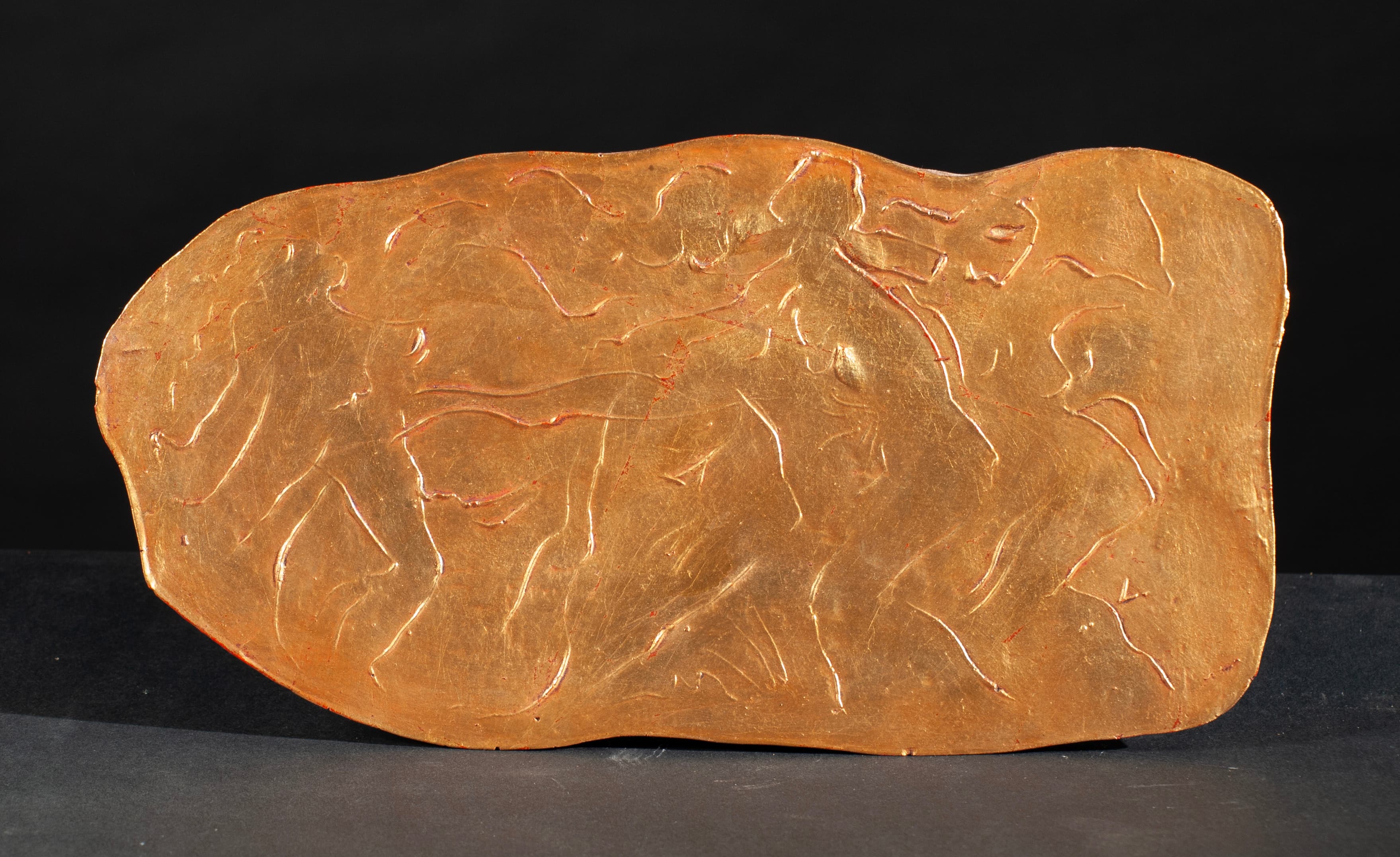 Art with the title "Dancers Gold Plaque".