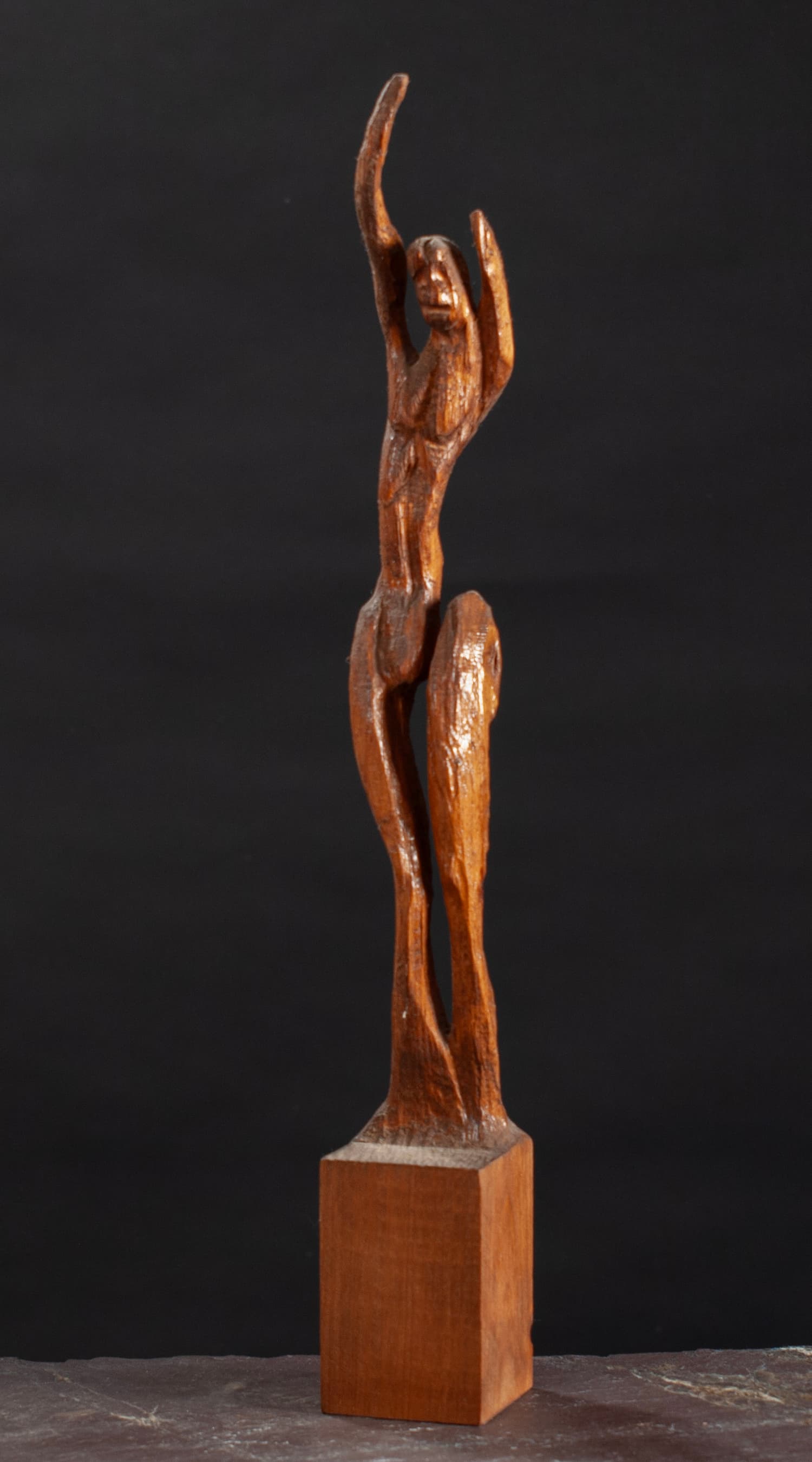 Art with the title "Female Figure with Arms Raised".
