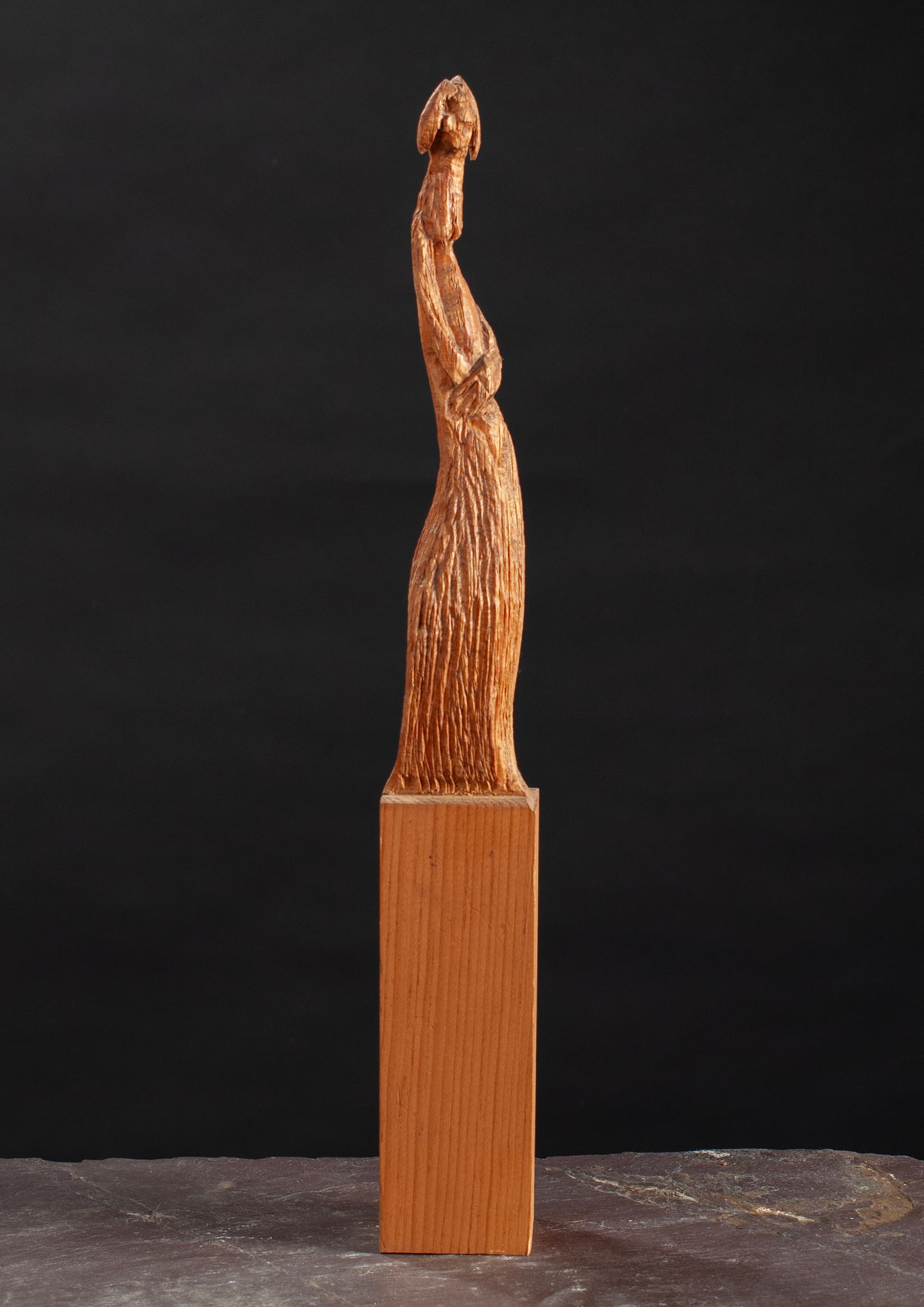 Art with the title "Woman with Arms Folded".